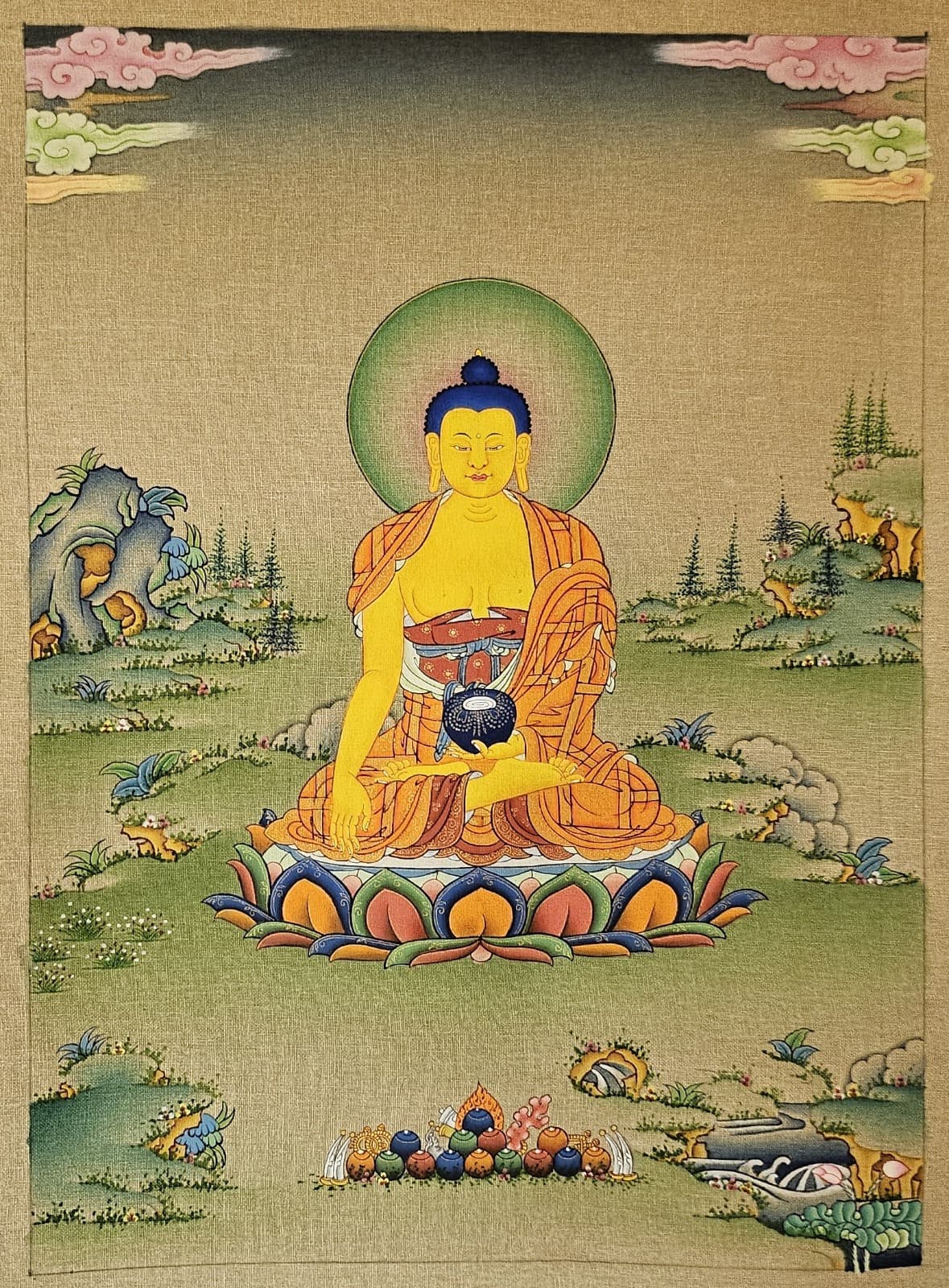 The finished thangka with full detail, gold work, and completed landscape